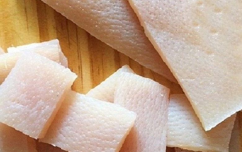 Lột da heo thủ công năng suất thấp, không hiệu quả